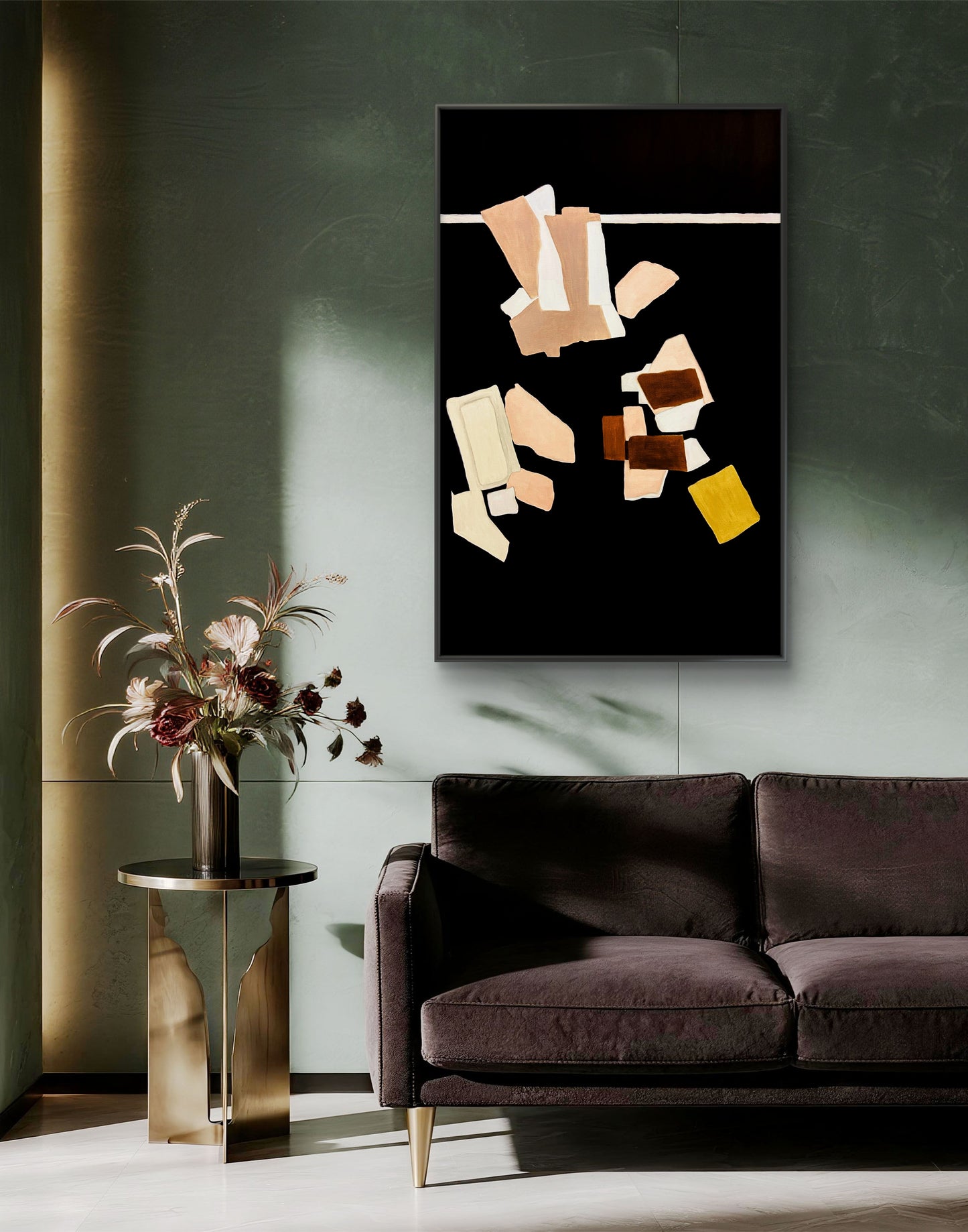 Abstract art piece on a wall above a dark brown sofa in a modern living room.