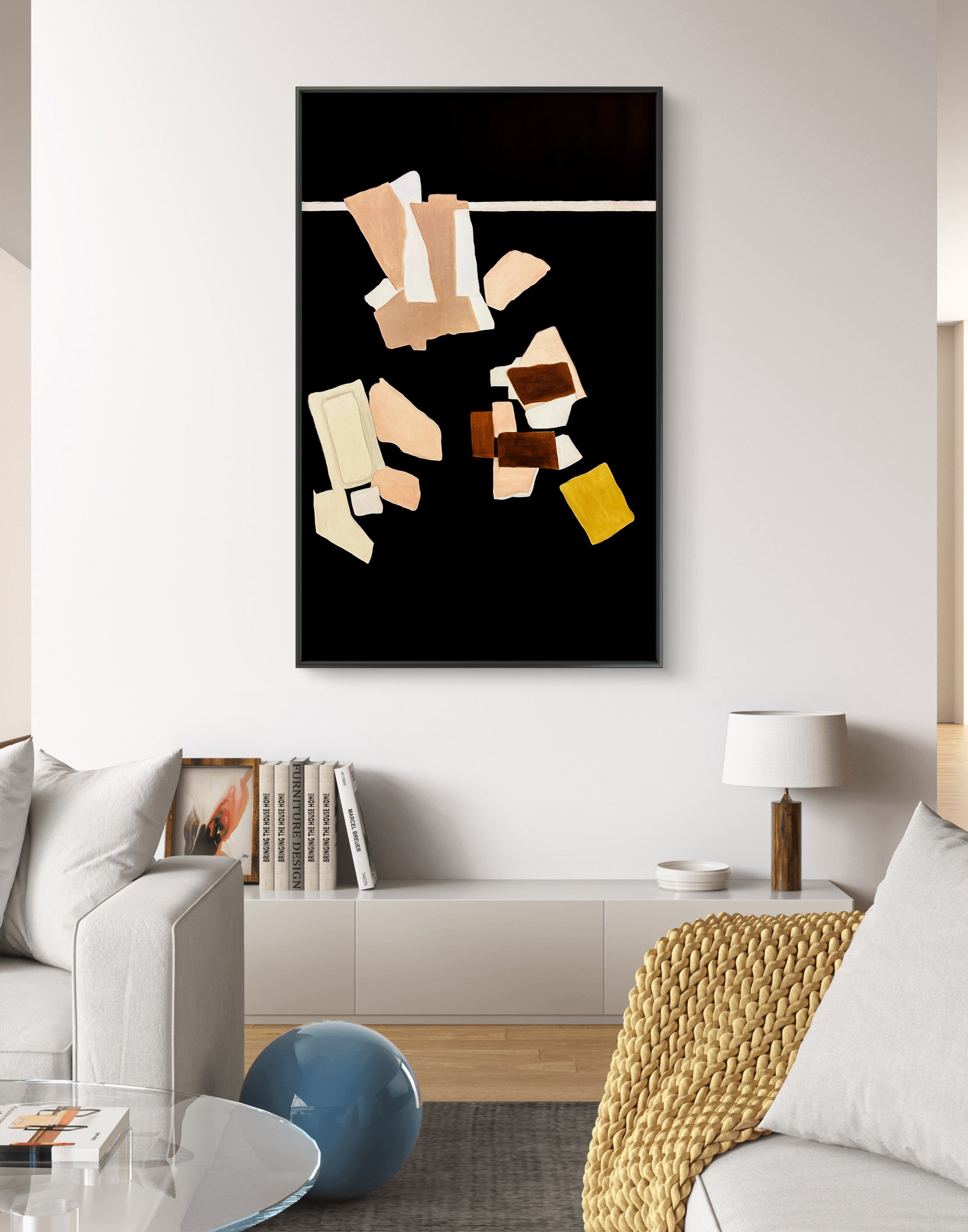 Abstract art piece on a wall in a modern living room