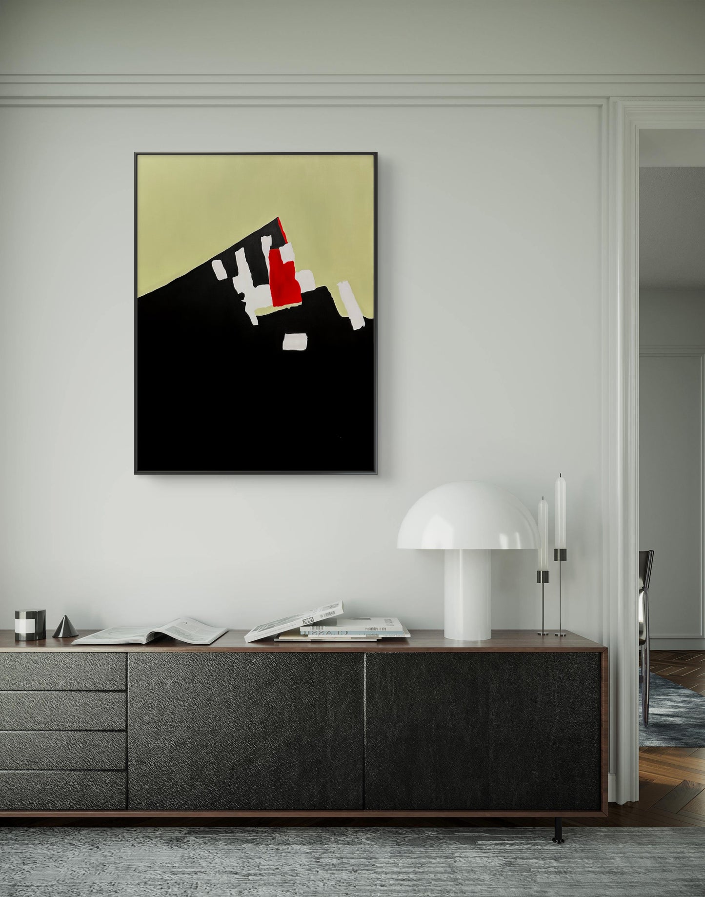 Modern interior with a abstract painting on the wall above a wooden cabinet.