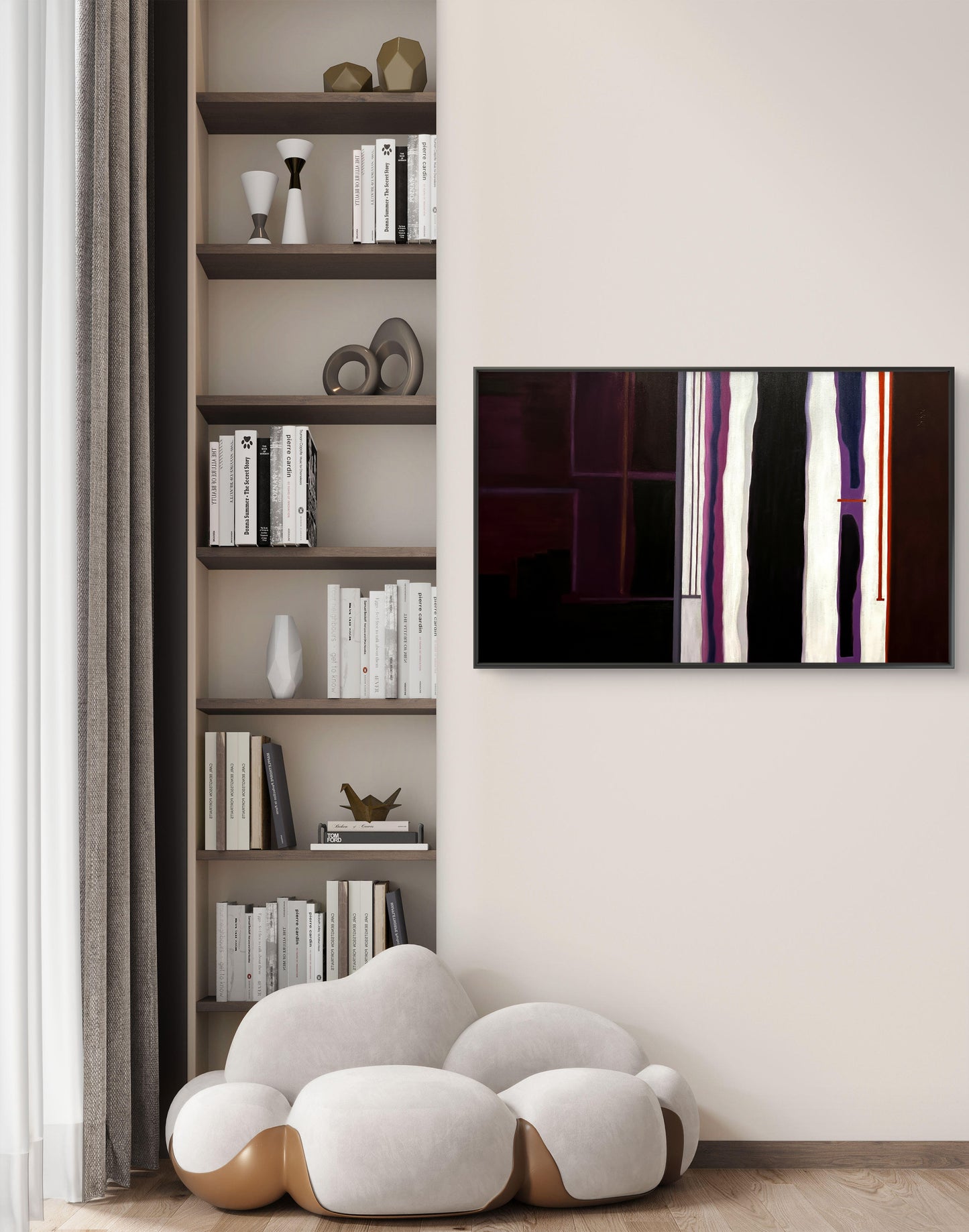 Modern interior with a bookshelf, abstract painting, and decorative pillows.